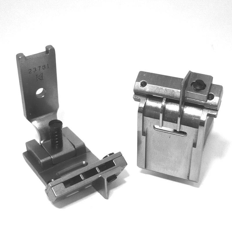 23781 Grooved Tape Attaching Foot with Guide — Grooved Tape Attaching Foot with Guide for Singer / Juki Zigzag Machine Elastic tape size and guide position can be adjusted. Elastic Tape Size : 5 ~ 16mm Needle Hole Width : 13mm Presser Foot Width : 22mm Groove Width : 16mm