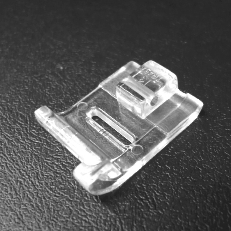 TR-457 Plastic Presser Feet — Right Edge Guiding Distance between Guide & Needle Hole : 0 mm Needle Hole Size : 11.5 mm x 2 mm