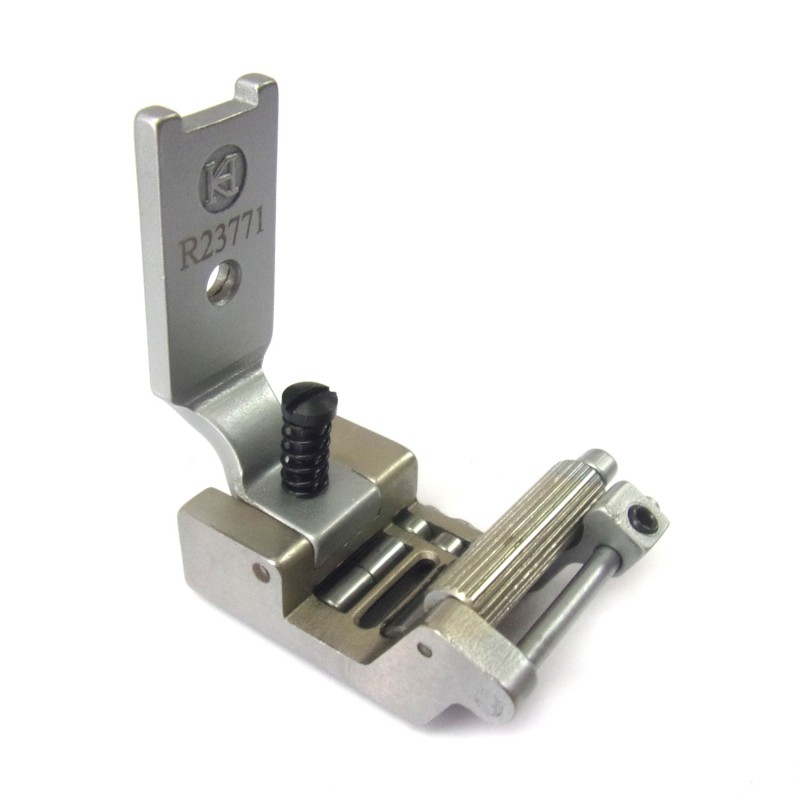R23771 Roller Foot — Roller Foot with Roller for Singer / Juki Zigzag Machine Tape guide is adjustable. Bottom rollers help the tape run smoothly. Easy to attach a sticky tape/elastic (e.g. Silicone Elastic Tape) to the fabric. Maximum Tape Size : 20mm Needle Hole Width : 11mm Pressing Width : 17mm