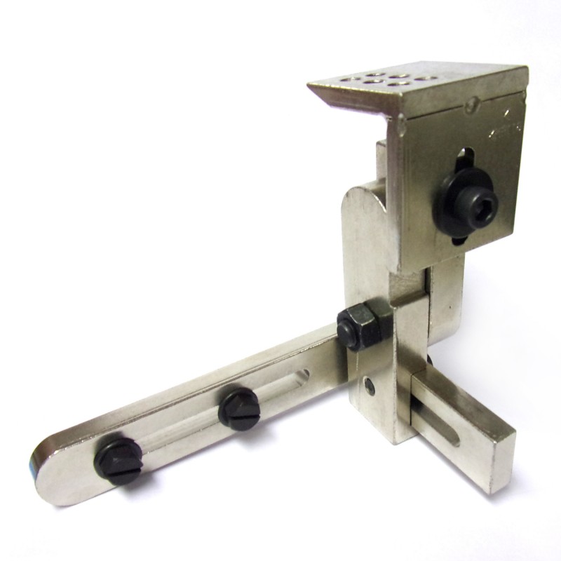 KHF115 Folder Bracket — Swing type bracket. It can swing the folder up and down. The folder is swung up before sewing. The user can fold the tape inside at the beginning (closing end waist-band). It can be used together with KHF1508 Waist Band Folder for mounted on Kansai Special DLR-1508 machine.